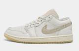 Nike Women’s Air Jordan I Low SE Shoes (Sail/Pale Ivory/Team Gold) – $64 ($130 Value) $64.00